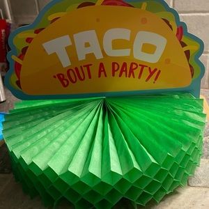 Three double sided taco themed table decorations